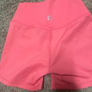 XS shorts. Buffbunny. Coral with cute side detail.